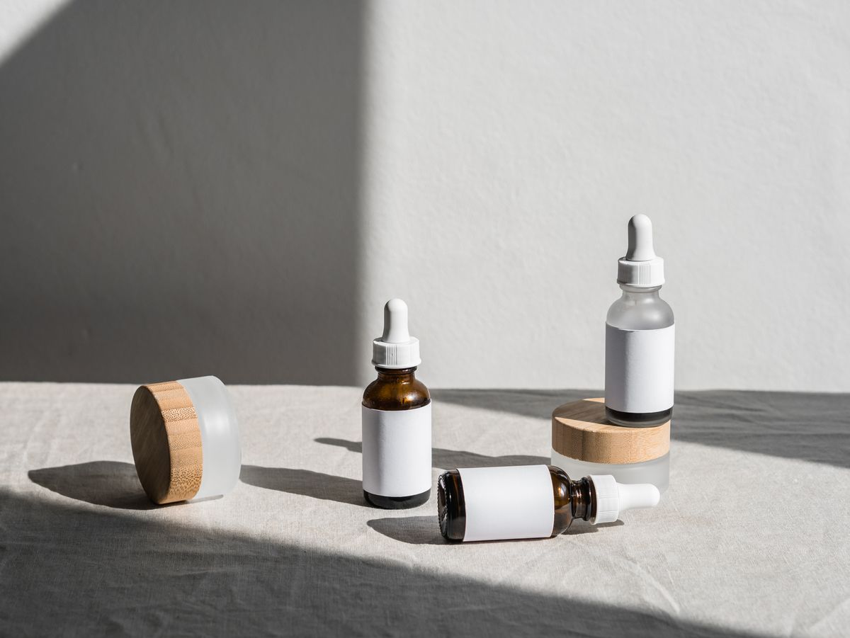 Skincare bottles and jars arranged on a shelf