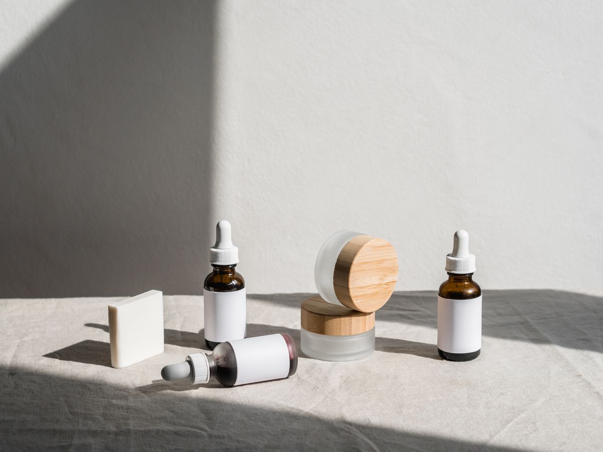 Skincare bottles and jars arranged on a shelf