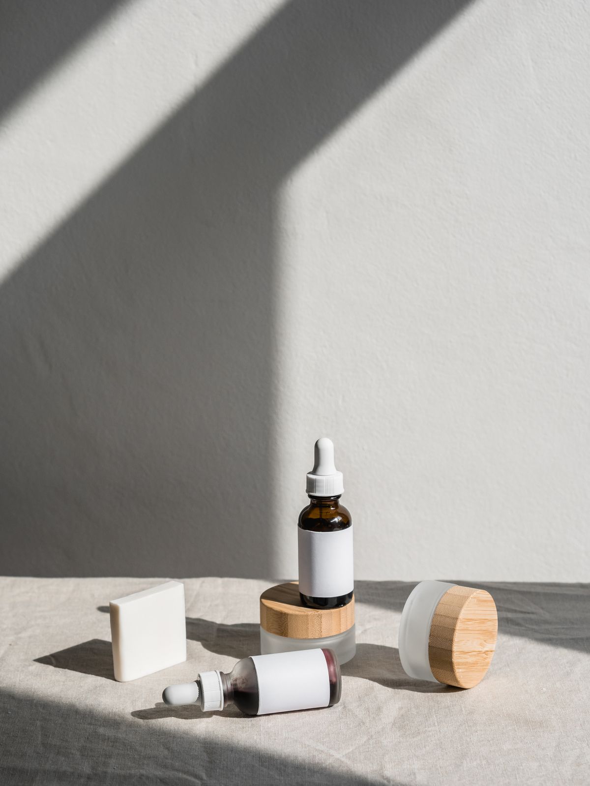 Skincare bottles and jars arranged on a shelf