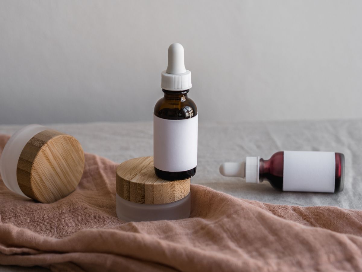 Skincare bottles and jars arranged on a shelf