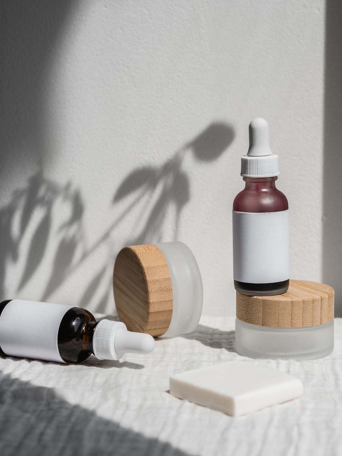 Skincare bottles and jars arranged on a shelf