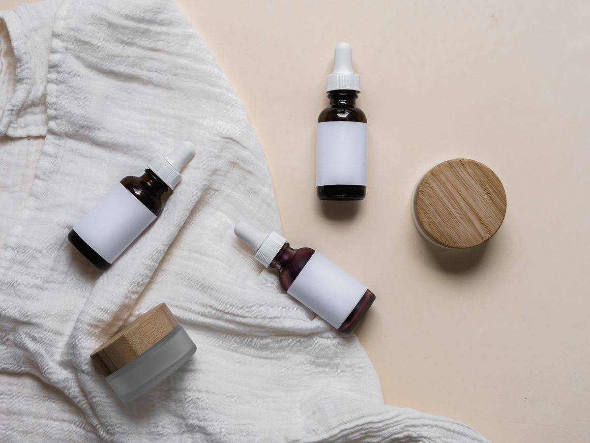 Skincare bottles and jars arranged on a shelf