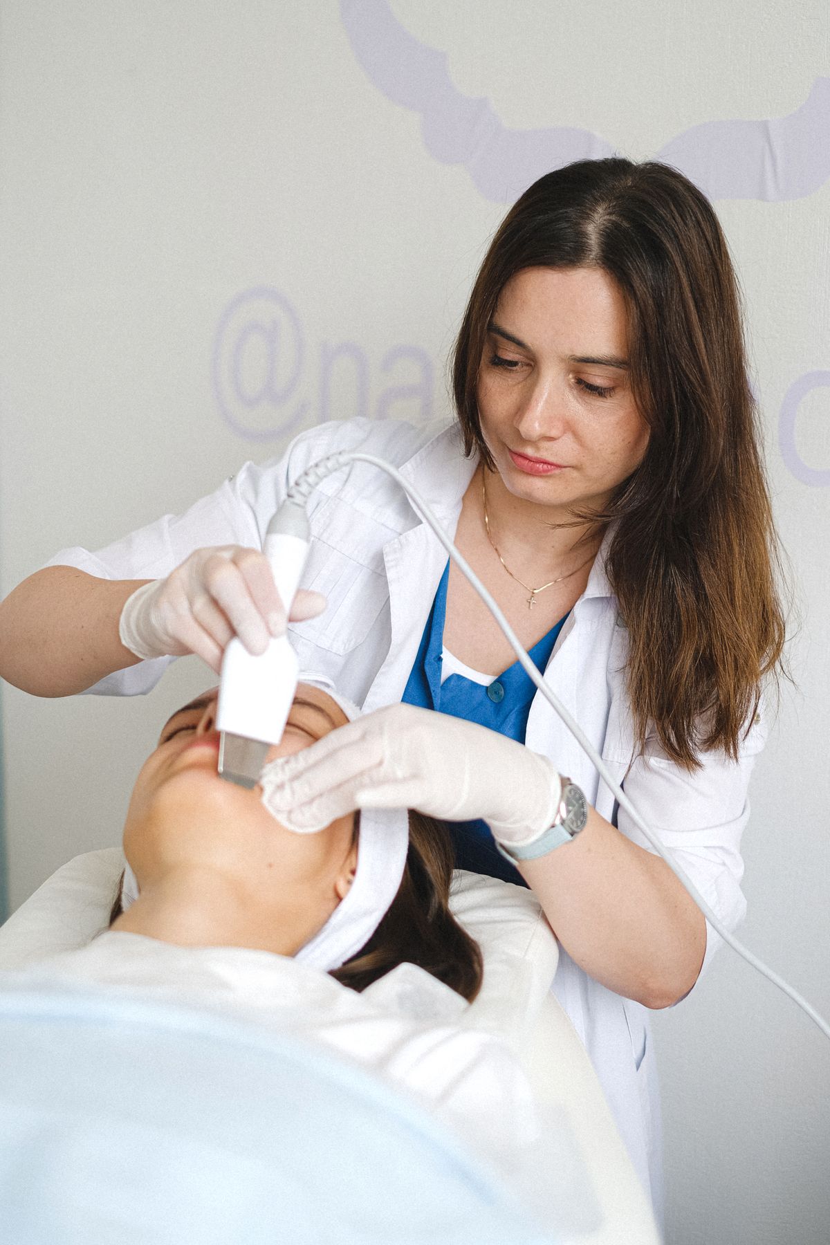 Illustrative facial-care appointment in a treatment room