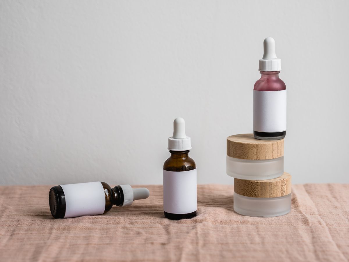 Skincare bottles and jars arranged on a shelf